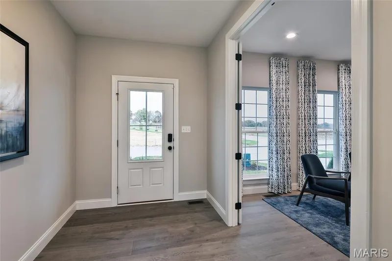 Entrance foyer with view of front door and study — 430 Farmhouse Drive, O'Fallon, MO 63385