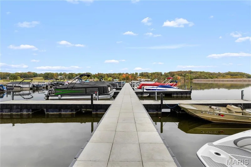 Dock area featuring a water view — 10107 Greenbriar Court, Foristell, MO 63348