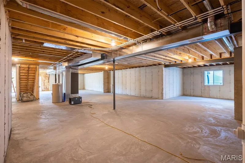 Below grade area featuring water heater — 300 Schaper Estates Xing, Foristell, MO 63348