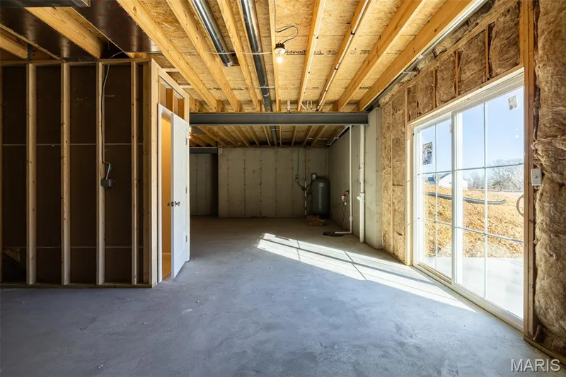Basement with a water pressure tank — 300 Schaper Estates Xing, Foristell, MO 63348