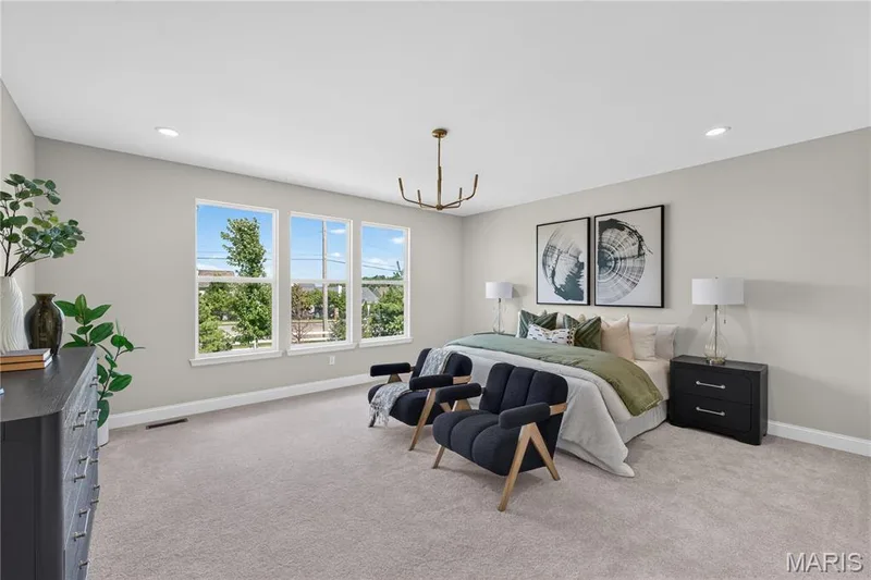 Owner's Suite with walk-in closet and ensuite bathroom — 126 Royal Troon Drive, Dardenne Prairie, MO 63368