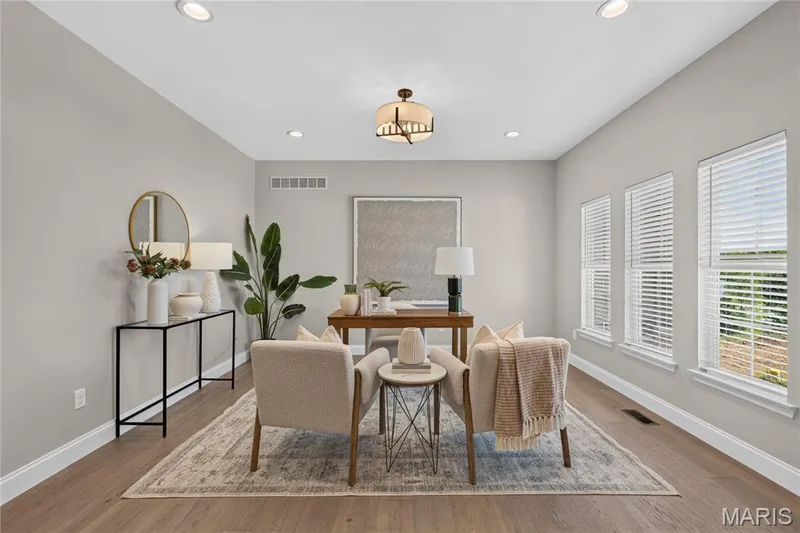 Recessed lighting, wood-finish flooring, multiple windows, overhead lighting fixture, and light-toned wall paint — 128 Royal Troon Drive, Dardenne Prairie, MO 63368