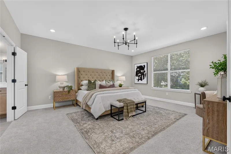 Carpeted flooring, recessed lighting, and a modern chandelier — 128 Royal Troon Drive, Dardenne Prairie, MO 63368