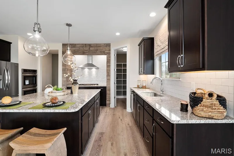 Example Picture of the Forest, some features shown may be optional upgrades — 409 Amberleigh Manor Drive, Wentzville, MO 63385