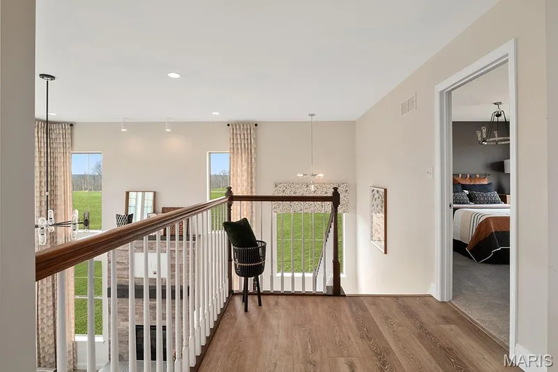 Example Picture of the Forest, some features shown may be optional upgrades — 409 Amberleigh Manor Drive, Wentzville, MO 63385