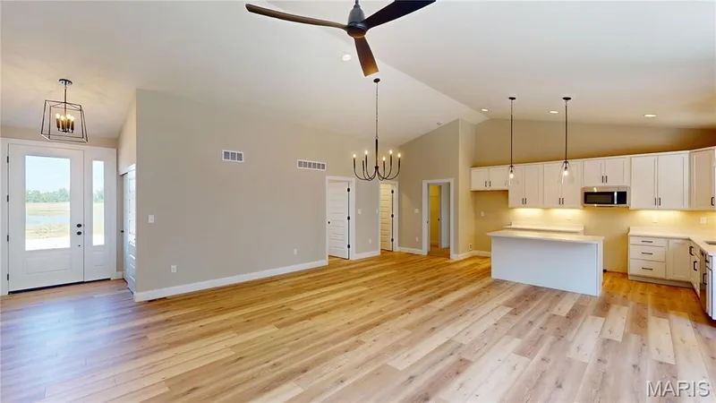 Great Room Open to Kitchen — 130 River Grove Court, O'Fallon, MO 63366