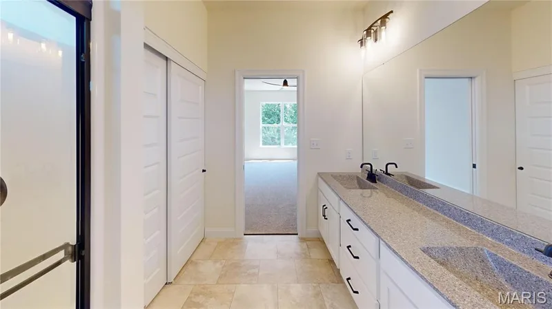 Primary Bath with Double Bowl Adult Height Vanity — 130 River Grove Court, O'Fallon, MO 63366