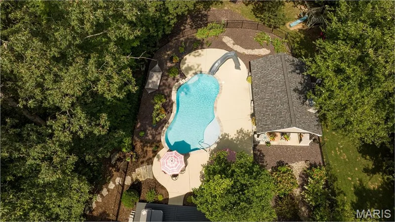 Drone view of home and pool — 51 Nordic Lane, Defiance, MO 63341