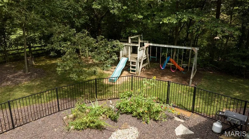 Backyard play area outside of pool space — 51 Nordic Lane, Defiance, MO 63341