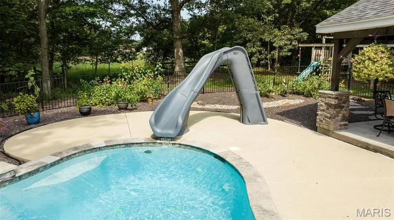 Pool has slide — 51 Nordic Lane, Defiance, MO 63341