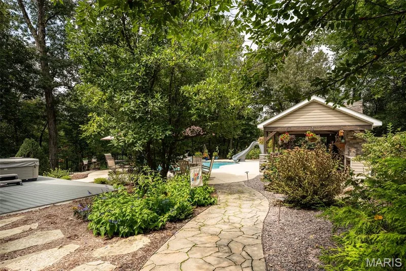 Stone pathway to pool — 51 Nordic Lane, Defiance, MO 63341