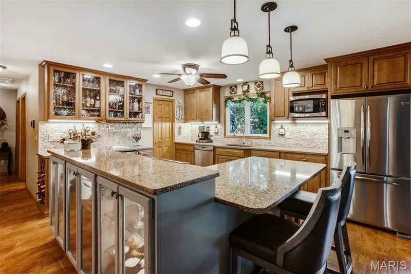 Kitchen breakfast bar — 51 Nordic Lane, Defiance, MO 63341
