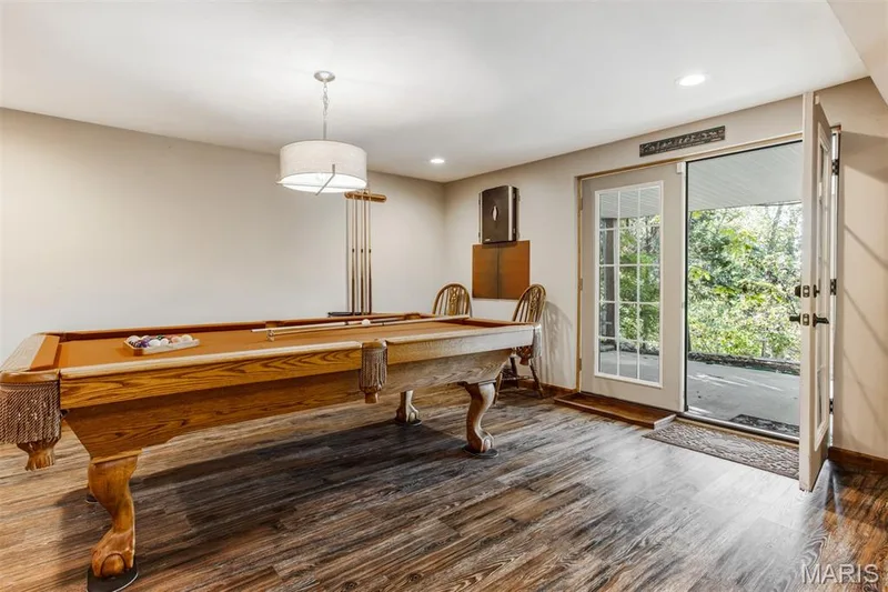 French doors lead to covered patio — 51 Nordic Lane, Defiance, MO 63341