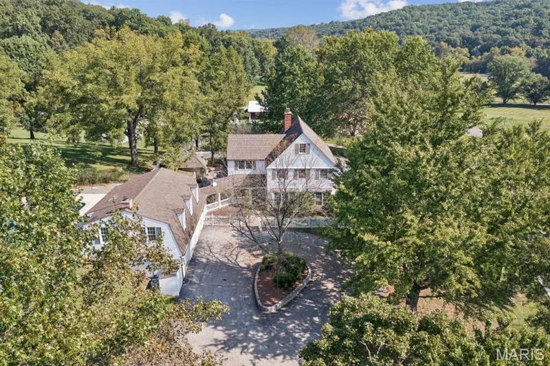 Two-story property with a dormer roof and multiple windows, featuring a detached two-story structure with a dormer roof — 2333 Ossenfort Road, Wildwood, MO 63038