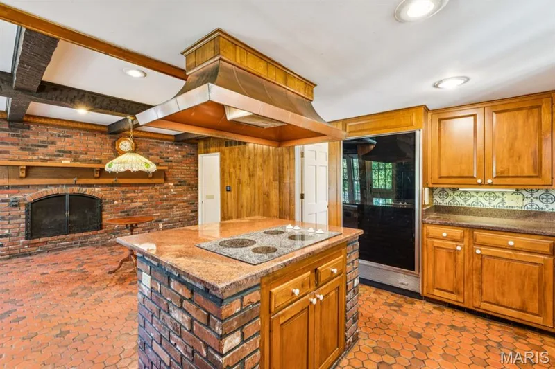 Brick flooring and fireplace with a wood mantel — 2333 Ossenfort Road, Wildwood, MO 63038