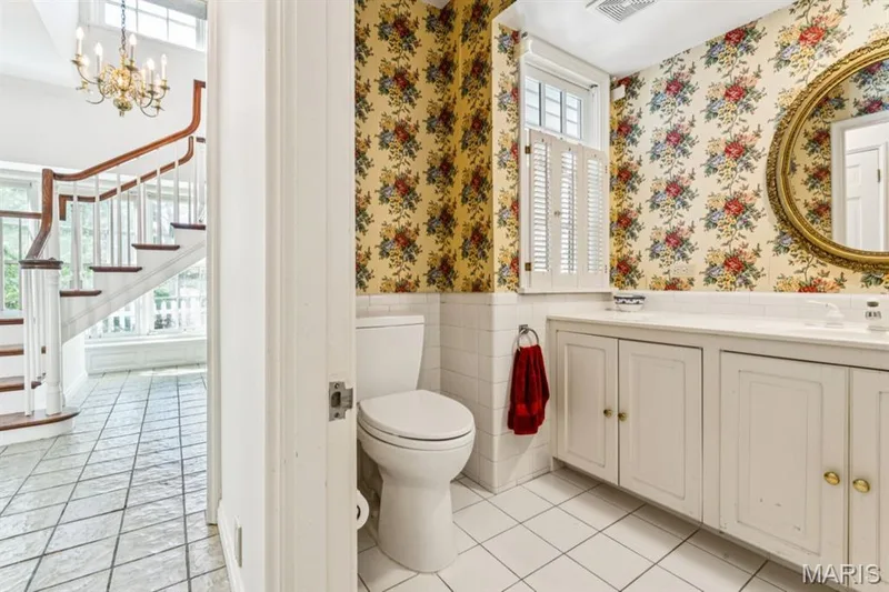 White-tiled flooring and wainscoting with floral wallpaper — 2333 Ossenfort Road, Wildwood, MO 63038
