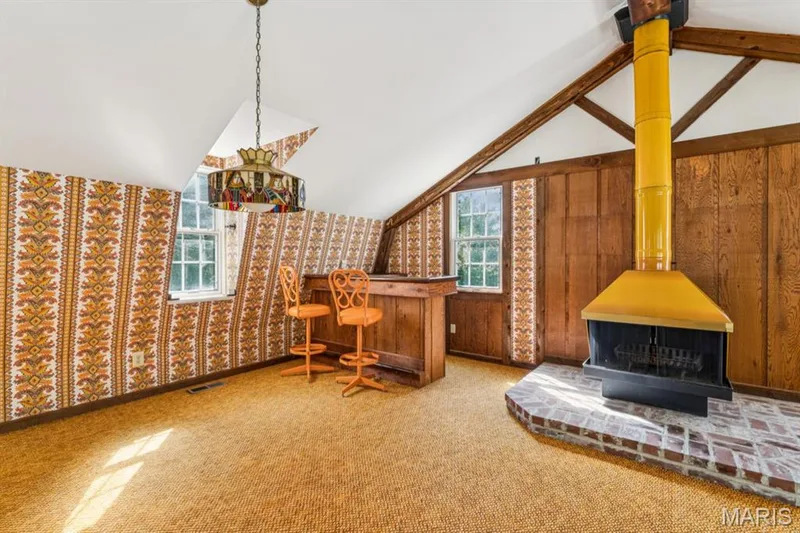 Fantastic retro rec room to enjoy, sits above the garage and overlooks the salt-water pool. — 2333 Ossenfort Road, Wildwood, MO 63038