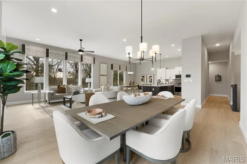 Dining Room with view of Family room and Kitchen areas — 325 Healthy Way, St Charles, MO 63304