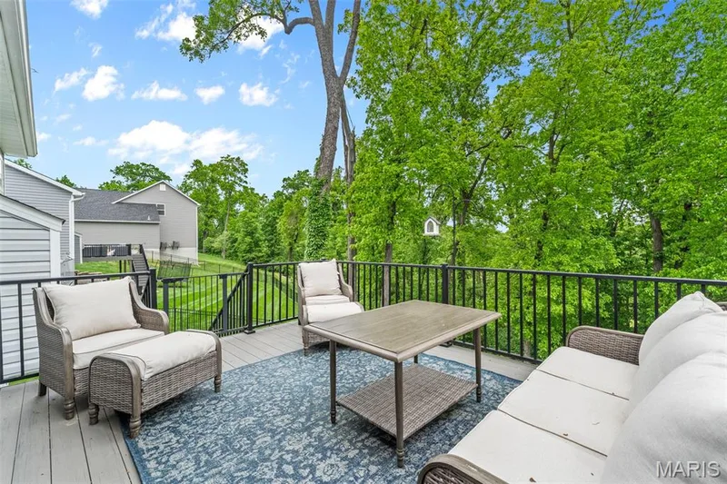 Deck located off the Breakfast Room has private views of the wooded common area. — 1010 Timber Bluff Drive, Wentzville, MO 63385