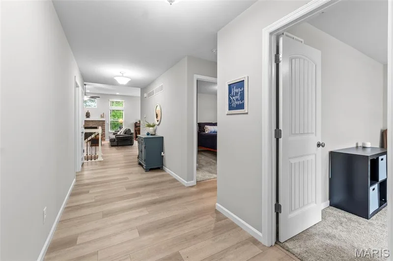 Entry w/ view of bedrooms to the right and the Great Room down the hall. — 1010 Timber Bluff Drive, Wentzville, MO 63385