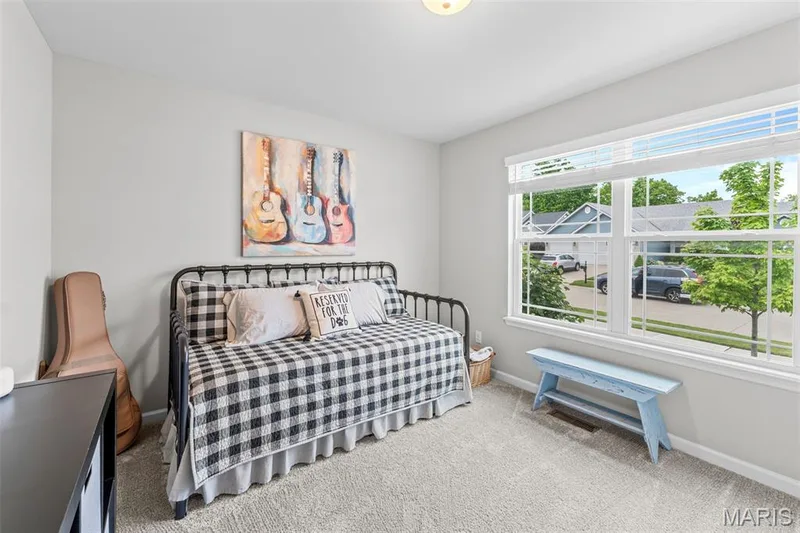 Secondary bedroom with window view to the street — 1010 Timber Bluff Drive, Wentzville, MO 63385