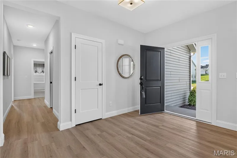 Entryway featuring Luxury Vinyl Plank flooring — 301 Healthy Way, St Charles, MO 63304