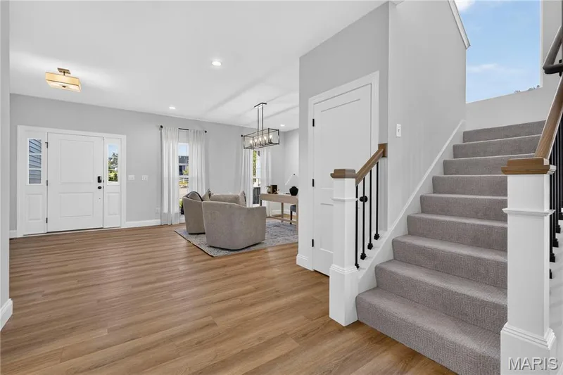 Luxury Vinyl Plank flooring throughout the main level — 301 Healthy Way, St Charles, MO 63304