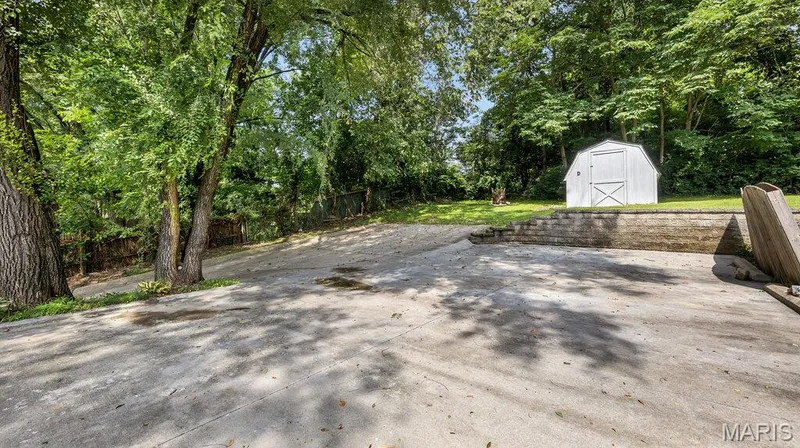 Driveway leads to a parking pad in the  back for just this building — 36 Lee Drive #C & D, St Charles, MO 63301