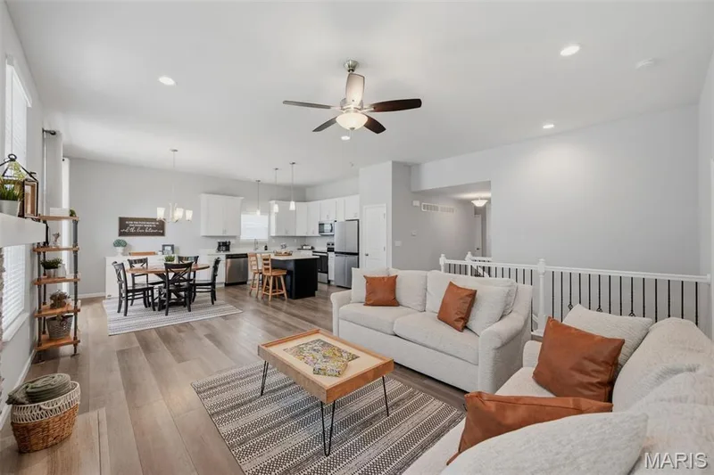Easy care wood LVP flooring throughout much of main level — 411 Knothole Lane, Wentzville, MO 63385