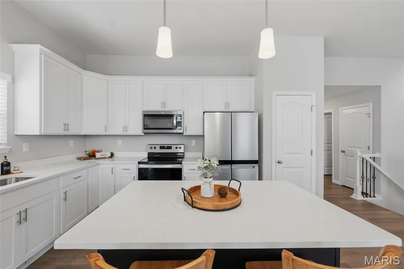 Stunning quartz countertops — 411 Knothole Lane, Wentzville, MO 63385