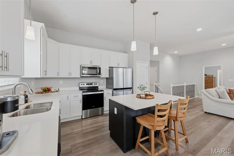 Sleek stainless steel appliances — 411 Knothole Lane, Wentzville, MO 63385
