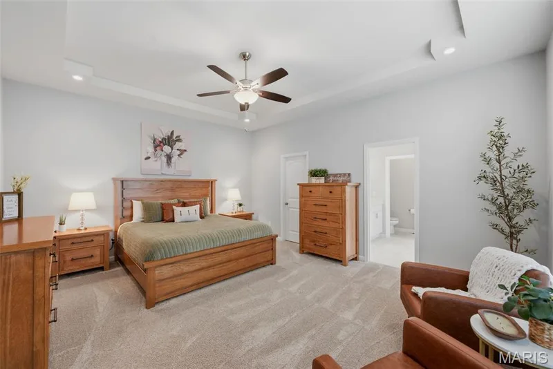 Spacious primary bedroom suite — 411 Knothole Lane, Wentzville, MO 63385