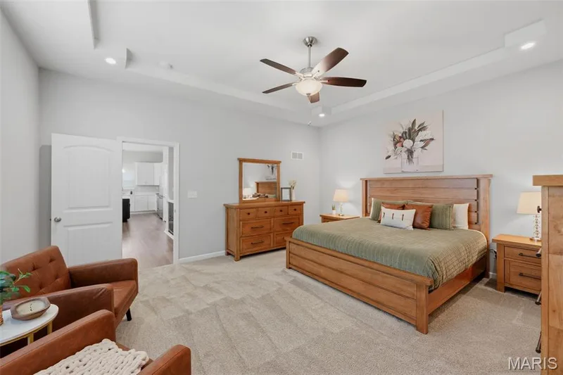 Beautiful tray ceiling with recessed lighting and fan — 411 Knothole Lane, Wentzville, MO 63385