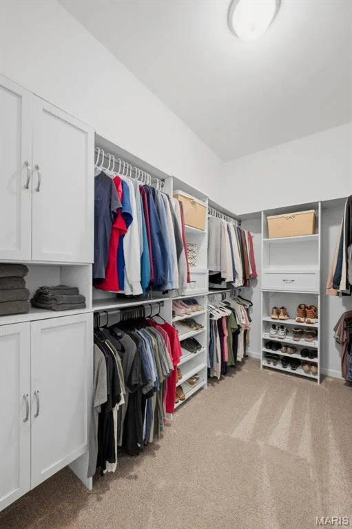Custom organization system in massive 11'x7' walk in closet — 411 Knothole Lane, Wentzville, MO 63385