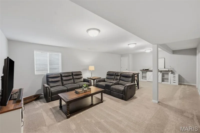 Egress window allows for natural light in the lower level — 411 Knothole Lane, Wentzville, MO 63385