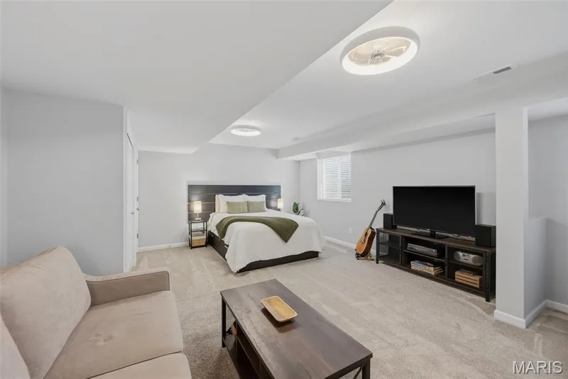 Two egress windows in this room allow for loads of natural light — 411 Knothole Lane, Wentzville, MO 63385