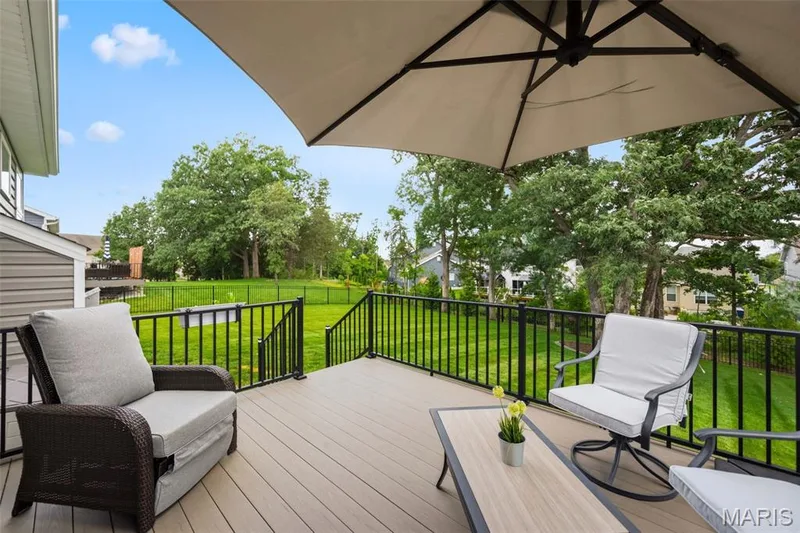 Just off the breakfast room, this composite deck awaits — 411 Knothole Lane, Wentzville, MO 63385