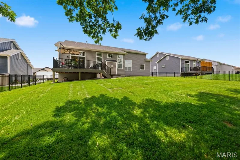 Large level yard with irrigation system — 411 Knothole Lane, Wentzville, MO 63385