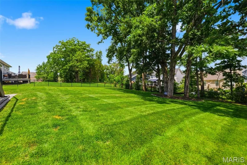 Fully fenced yard with 2 gates for entry — 411 Knothole Lane, Wentzville, MO 63385