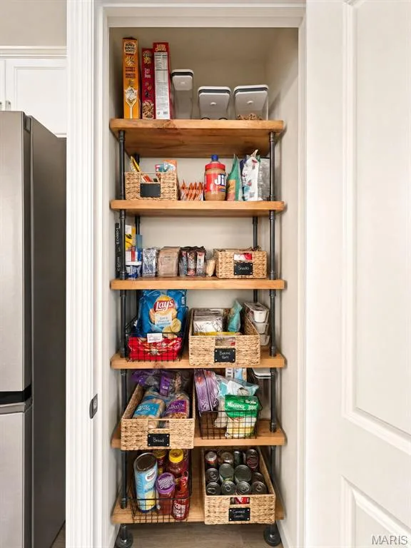 Pantry, custom shelving stays — 411 Knothole Lane, Wentzville, MO 63385