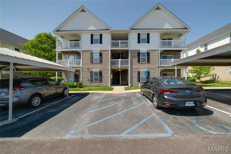 Welcome to 4101 Spring River! Includes one covered parking spot. — 4101 Spring River Drive #1B, O'Fallon, MO 63368