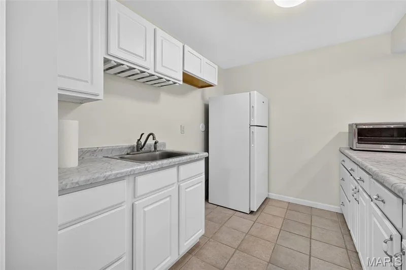 Basement Kitchen — 202 Park Ridge Drive #64a, O'Fallon, MO 63366