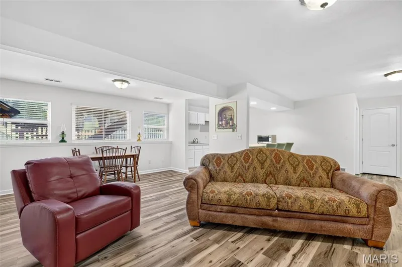 Basement Living & Dining Room — 202 Park Ridge Drive #64a, O'Fallon, MO 63366