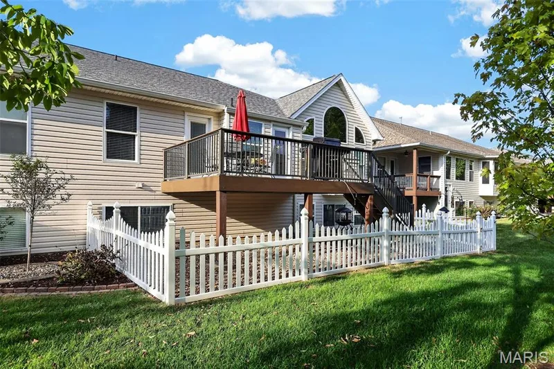 Backyard view w/ Fence — 202 Park Ridge Drive #64a, O'Fallon, MO 63366