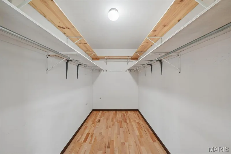 walk-in closet in primary bedroom — 15645 Dresden Lake Court, Chesterfield, MO 63017