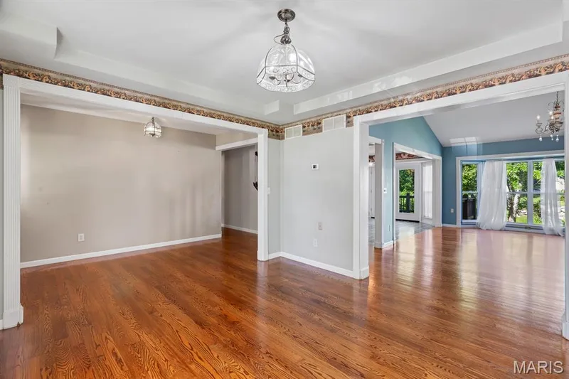 Supper club happen here! Dinner parties happen here! Large Dining room opens to Vaulted great room. — 1103 Panda Court, Wentzville, MO 63385