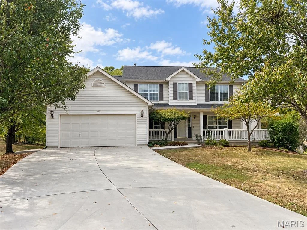 BRAND NEW ROOF! Two-story traditional exterior with white siding — 1103 Panda Court, Wentzville, MO 63385