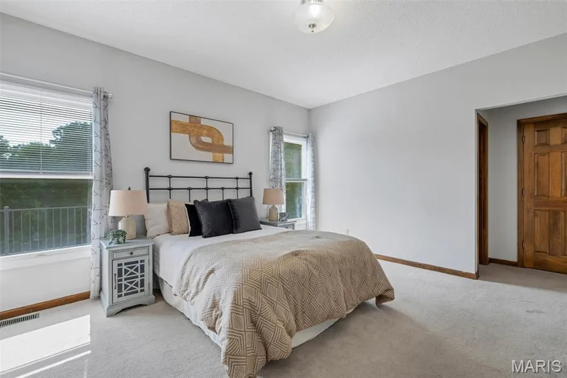 main floor primary bedroom — 195 England Drive, O'Fallon, MO 63366