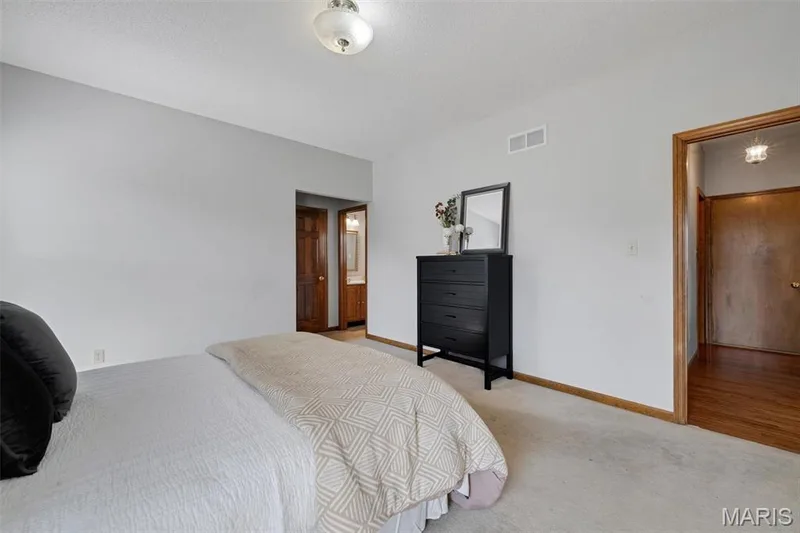 main floor primary bedroom — 195 England Drive, O'Fallon, MO 63366