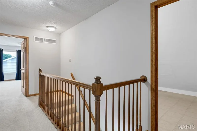 Divided bedrooms on upper level — 195 England Drive, O'Fallon, MO 63366